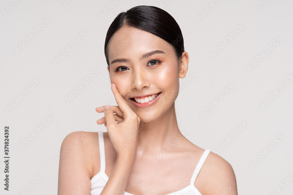 Beautiful Asian young woman smile with clean and fresh skin Beautiful Asian young woman smile with clean and fresh skin