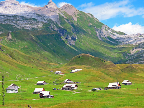 Traditional alpine livestock settlement Tannalp next to Lake Tannensee and in the Uri Alps massif, Melchtal - Canton of Obwald, Switzerland (Kanton Obwalden, Schweiz) photo