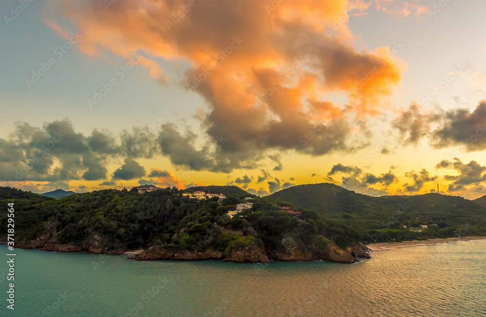 A view of the sunset over the coast of Antigua near St Johns