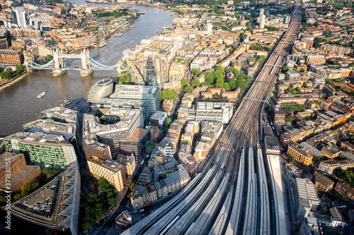 aerial sunset view of London Bridge train station overlooking Thames river  and Bridge Tower in London photo