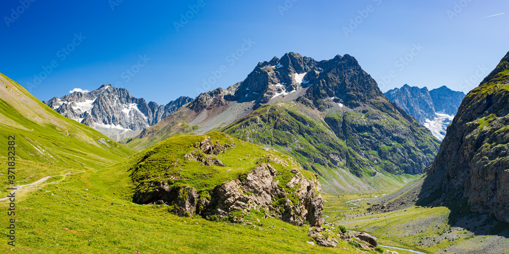 Mountain landscape on the french Alps, Massif des Ecrins. Scenic rocky mountains at high altitude with glacier