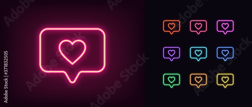 Neon heart icon. Glowing neon heart sign with message bubble photo