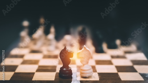 Chess board game concept illustrate Business strategy idea planing to checkmate the enemy and defeat opponent for achieve the target by intelligence idea with copy space photo