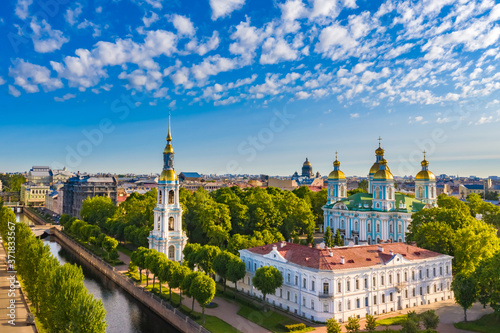 Saint Petersburg. Russia. St. Nicholas Cathedral view from a drone. St. Petersburg in sunny weather. Panorama of St. Petersburg with churches. Russian city on a summer day. Russian architecture.
