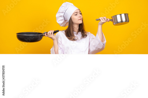 Woman cook learns to cook. ...