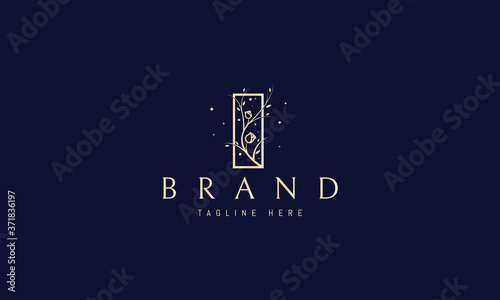 Vector elegant golden logo with an abstract image of a rose bush in a rectangle.