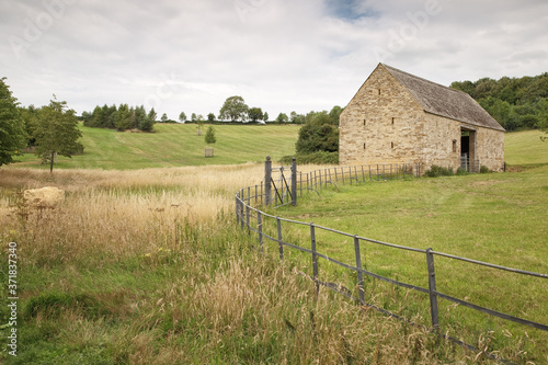 stone barn on a hill
