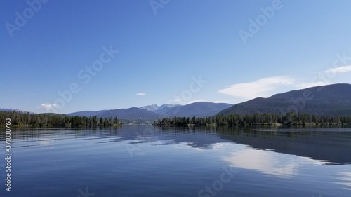 A calm lake in the Rocky Mountains © Jon