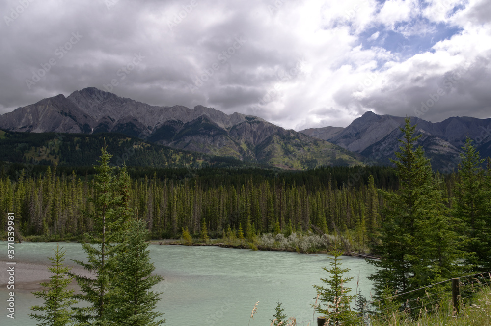 View of a River and Rocky Mountains