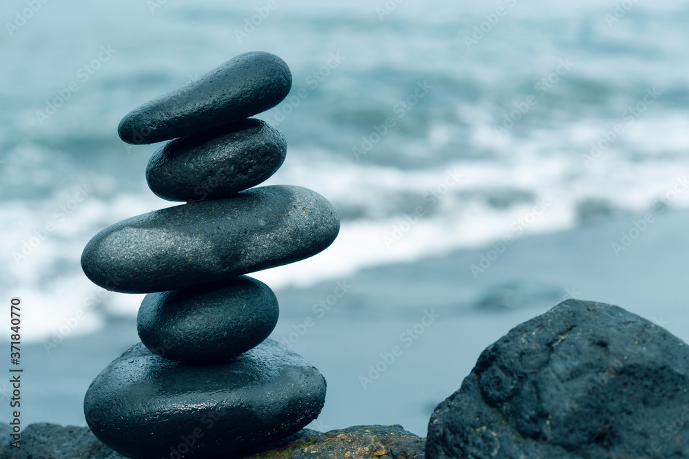 Balancing stones arranged in a pyramid shape Balancing stones arranged in a pyramid shape