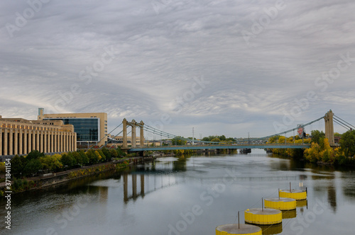 Hennepin Avenue suspension brdige over the Mississippi river at Minneapolis with Post Office and Federal Reserve Bank © Reimar