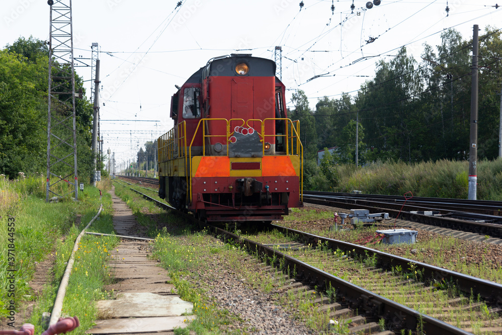 Railways. Diesel locomoRailways. Diesel locomotive on rails.tive on rails.