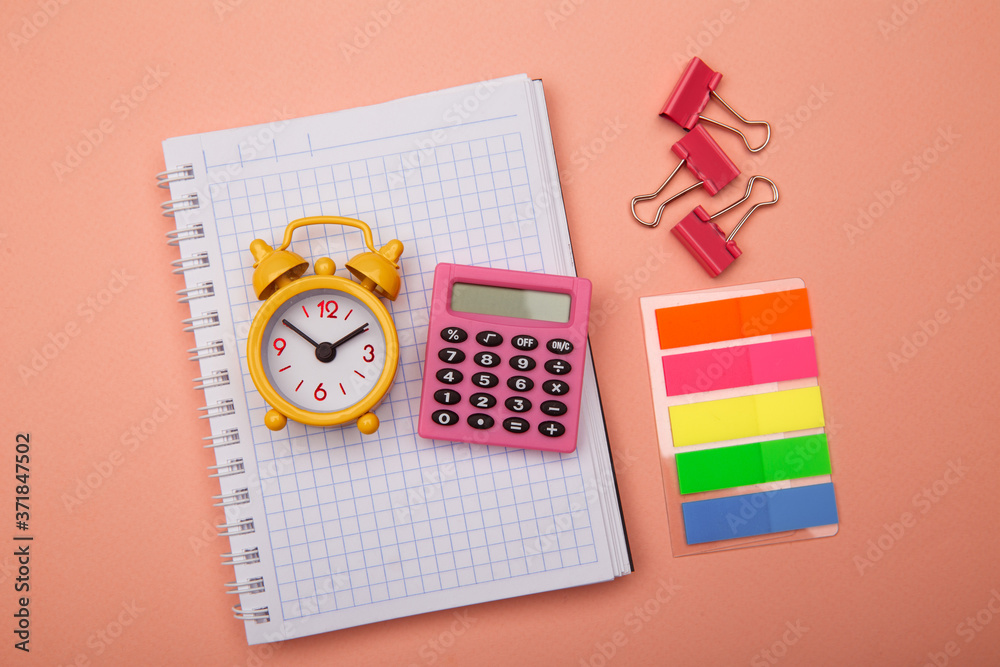 Obraz premium Creative flat lay. Back to school - school supplies on pink background.