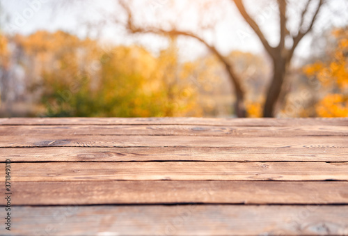 Empty wooden table nature bokeh background with a country outdoor theme,Template mock up for display of product