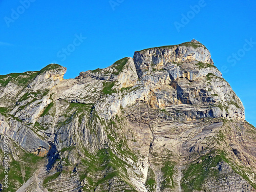 Alpine peaks Chli Haupt Murmelchopf and Haupt or Brünighaupt (Bruenighaupt oder Brunighaupt) in the Uri Alps mountain massif, Melchtal - Canton of Obwald, Switzerland (Kanton Obwalden, Schweiz) photo