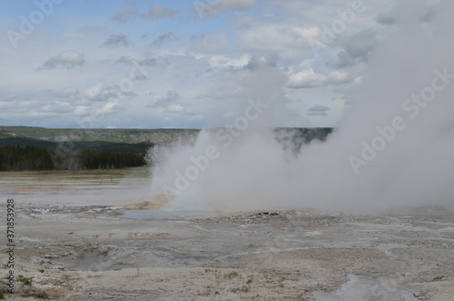 Late Spring in Yellowstone National Park: Clepsydra Geyser of the Fountain Group Erupts in Lower Geyser Basin