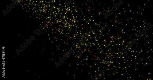 Appearing and disappearing golden particles. Confetti fountain for a festive background. Scattering magic shining dust.