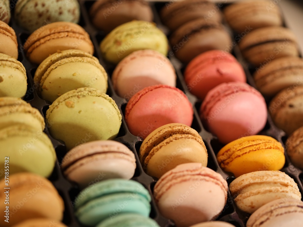 tasty colourful macaroons on a table tasty colourful macaroons on a table