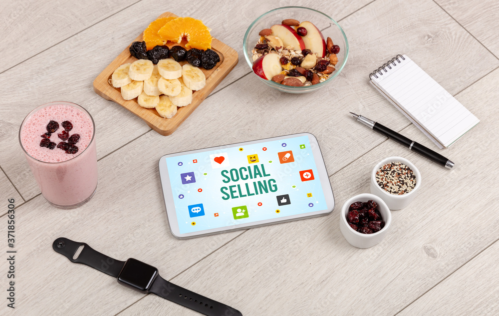 Healthy Tablet Pc compostion with SOCIAL SELLING inscription, Social networking concept