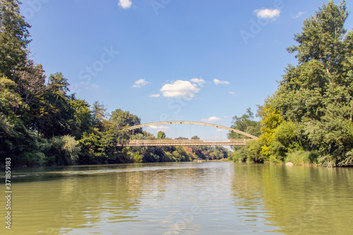  Russia city resort. View of the river along the green trees, rock 