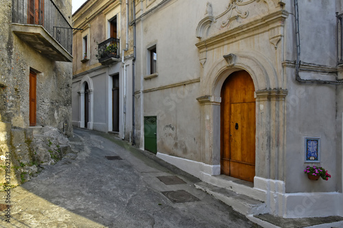 A narrow street between the old houses of San Nicola Arcella  a village in the region of Calabria  Italy.