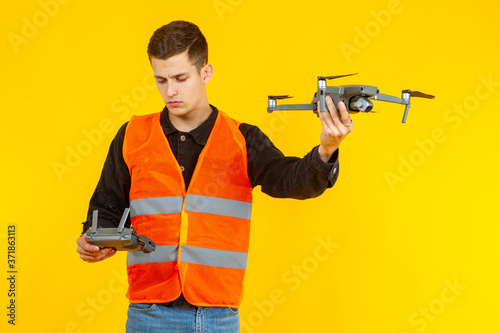 Quad copter. Man with a dro...
