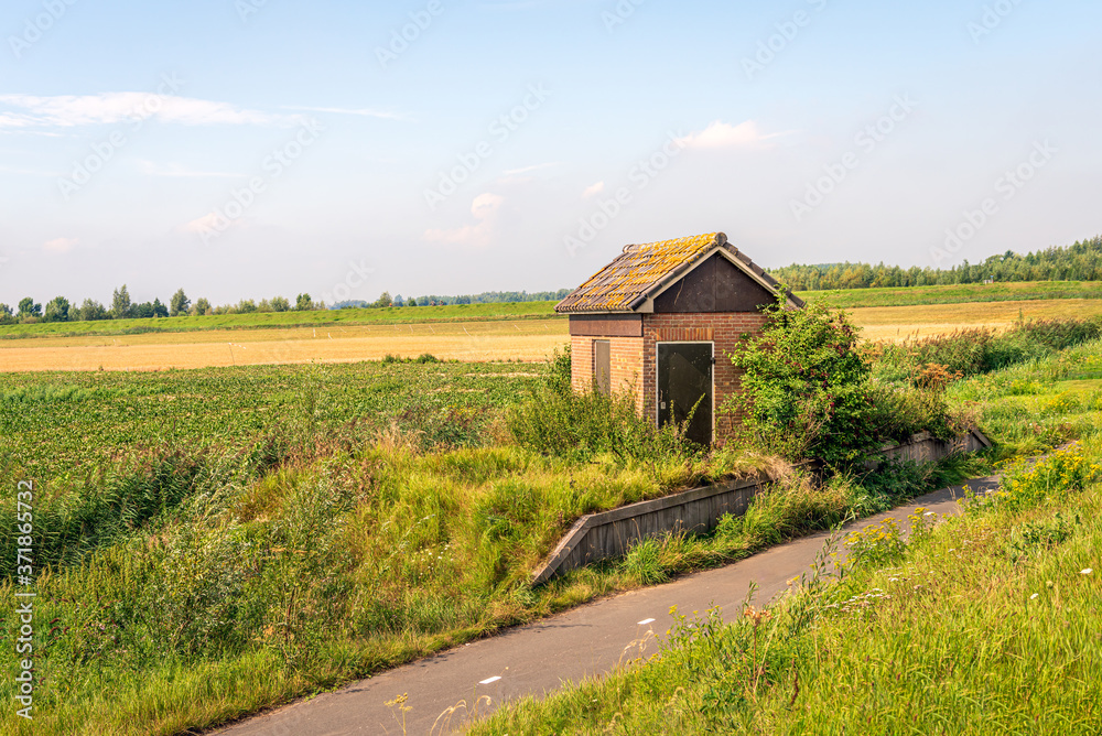 Small electricity building in a rural area in the Netherlands Small electricity building in a rural area in the Netherlands