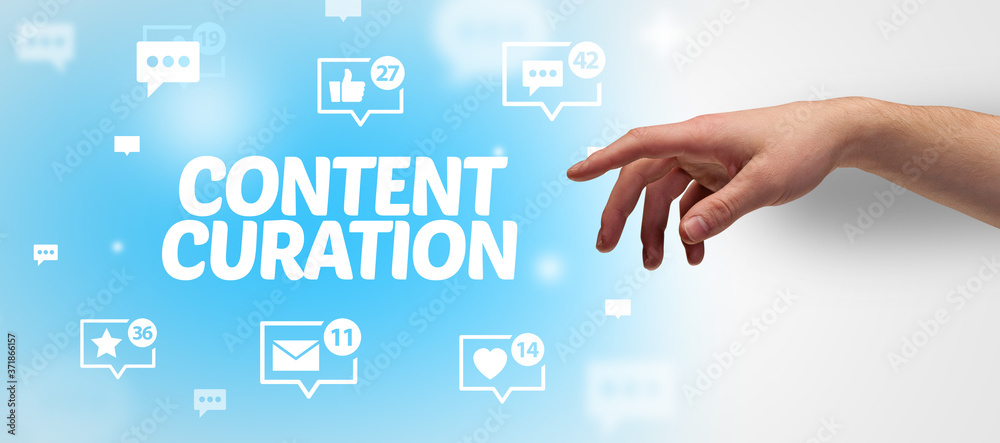 Close-Up of cropped hand pointing at CONTENT CURATION inscription, social networking concept Close-Up of cropped hand pointing at CONTENT CURATION inscription, social networking concept