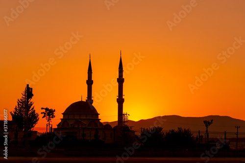 Mosque silhouette at sunset in Turkey