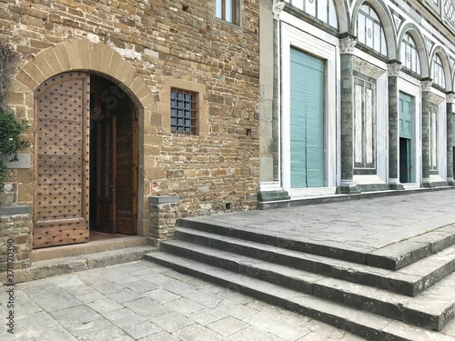 Florence, Tuscany, Italy - 07/14/2018: Basilica of San Miniato al Monte and the cemetery adjacent to the church. The place of rest of the author of 