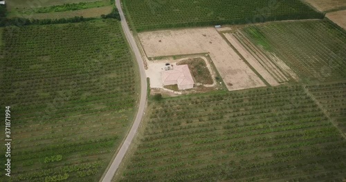 An orchard in the South of France enclose a newly constructed farm