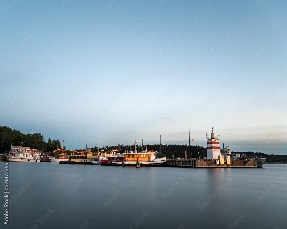 Pier at Vesijärvi Lake during sunset - Lahti. Finland