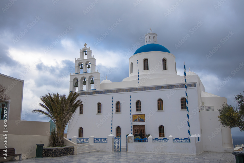 Panagia Platsani church in the picturesque village of Oia, Santorini, Greece (greek reads Panagia Platsani church in the picturesque village of Oia, Santorini, Greece (greek reads