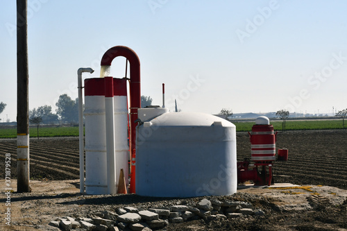 A red agriculture while pump