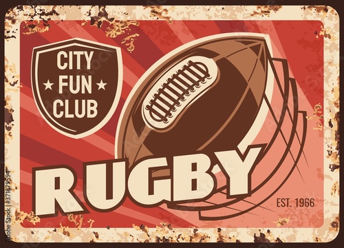 Rugby rusty metal plate, vector vintage card with ball in motion, trail and shield. American football sports equipment, city fun club rust tin sign. College, university rugby competition retro poster