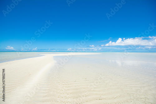 Fototapeta Naklejka Na Ścianę i Meble -  Long beach, white sand road in the blue ocean, Ngerkeklau island, Ngarchelong state, Palau, Pacific