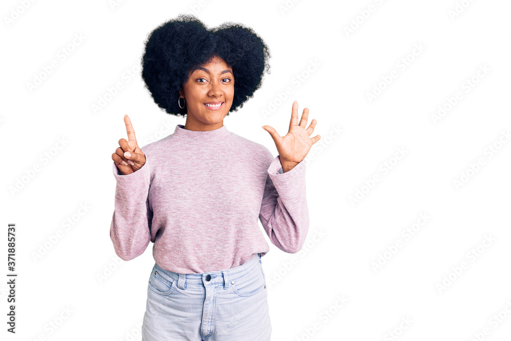 Young african american girl wearing casual clothes showing and pointing up with fingers number six while smiling confident and happy. Young african american girl wearing casual clothes showing and pointing up with fingers number six while smiling confident and happy.