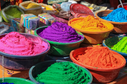 Hampi, India- January 1, 2019: Aromatic powder of different colors are sold during Hindu festival of Holi in Hampi, India 
