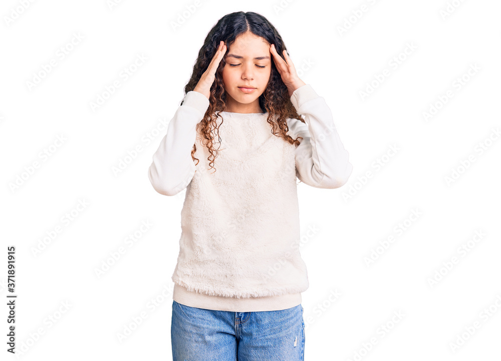 Beautiful kid girl with curly hair wearing casual clothes with hand on head for pain in head because stress. suffering migraine. Beautiful kid girl with curly hair wearing casual clothes with hand on head for pain in head because stress. suffering migraine.