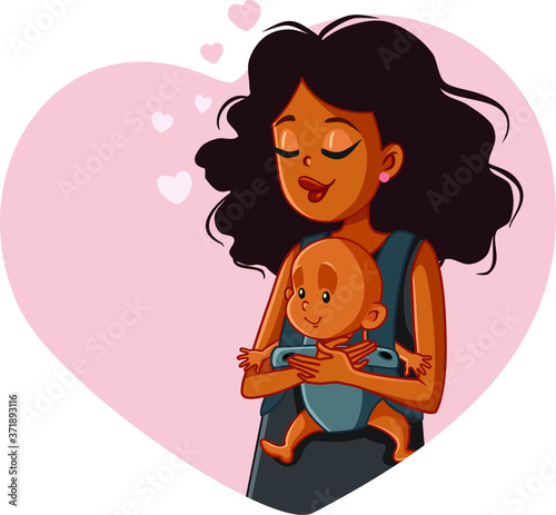 African Mother Holding Newborn in  Baby Wearing System