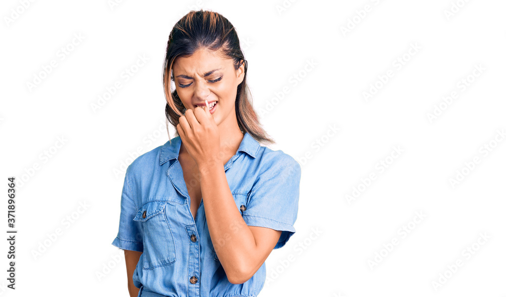 Young beautiful woman wearing casual clothes feeling unwell and coughing as symptom for cold or bronchitis. health care concept. Young beautiful woman wearing casual clothes feeling unwell and coughing as symptom for cold or bronchitis. health care concept.