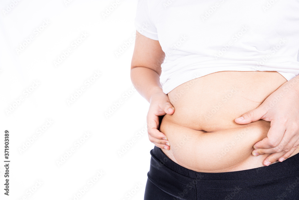 Fat woman holding excessive fat belly, overweight fatty belly isolated on over white background. Diet lifestyle, weight loss, stomach muscle, healthy concept. Fat woman holding excessive fat belly, overweight fatty belly isolated on over white background. Diet lifestyle, weight loss, stomach muscle, healthy concept.