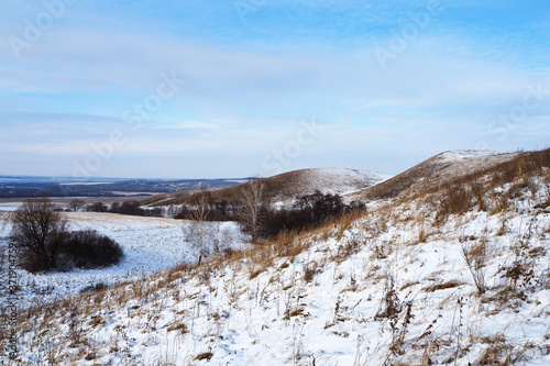 First snow. Colorful landscape of the countryside. Late autumn, November.
