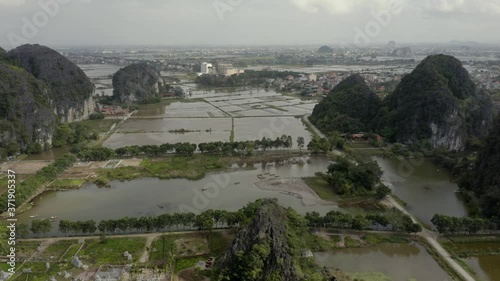 Cinematic drone rotation shot of Ninh Binh in Vietnam photo