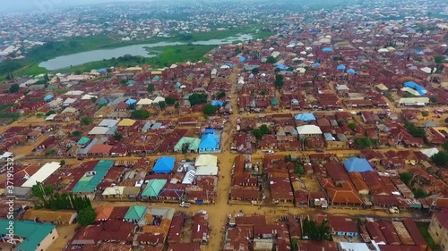 Aerial of town with a lake in Nasarawa, Nigeria during Harmattan photo