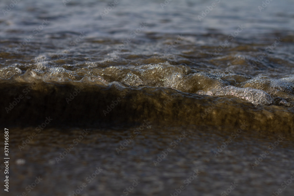 Waves breaking on a remote surf beach, New Zealand. 