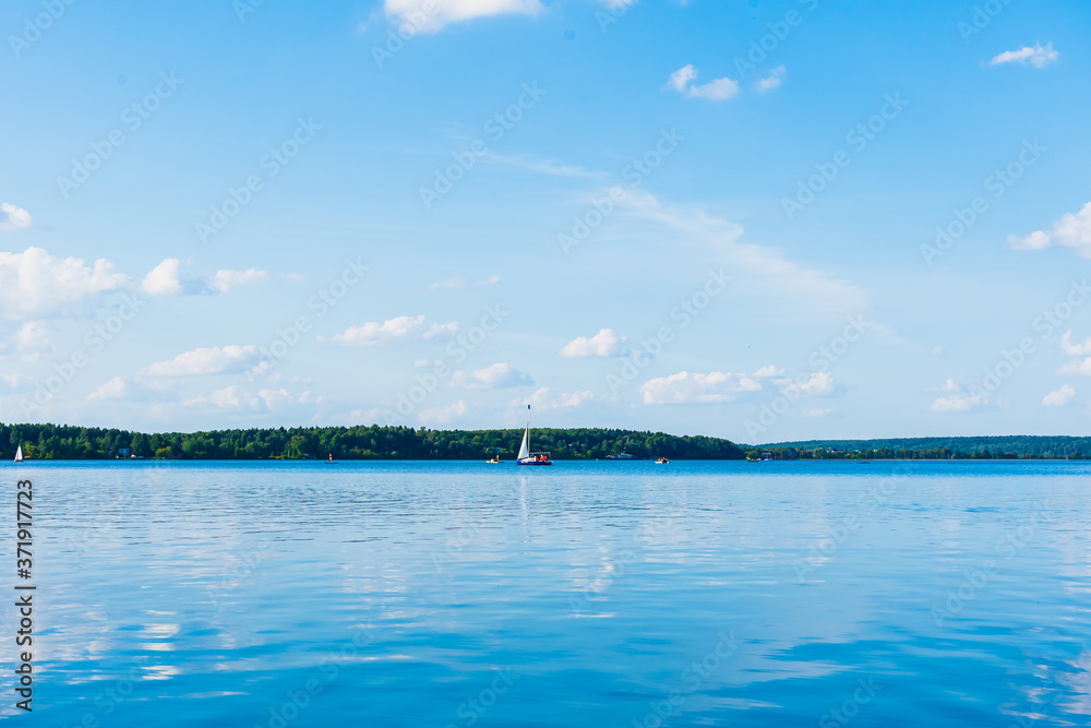 Blue water reflecting the sky at Senezh lake, Solnechnogorsk, Russia