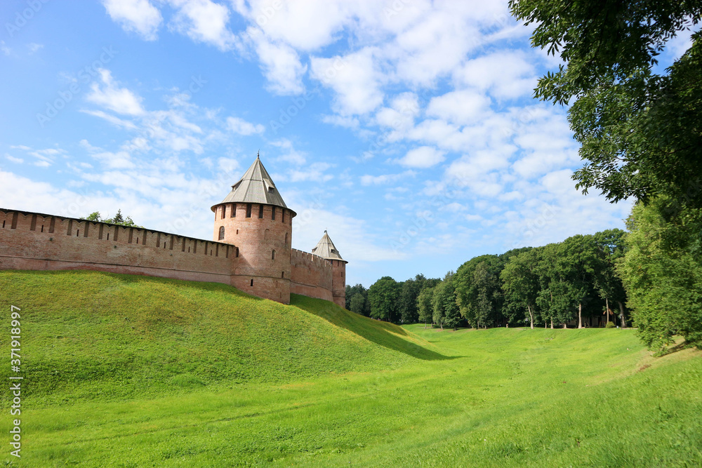 View to fedorov tower of the Velikiy (Great) Novgorod citadel (kremlin, detinets) in Russia under blue summer sky in the morning 