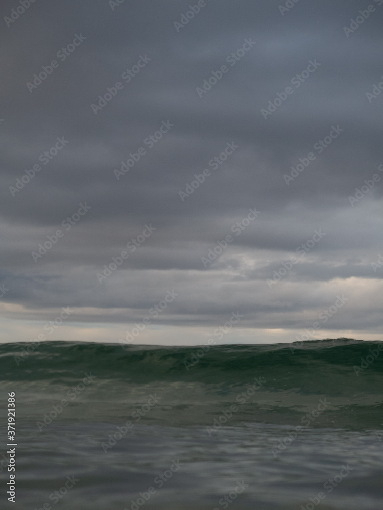 Small waves breaking on a surf beach, New Zealand. Small waves breaking on a surf beach, New Zealand.