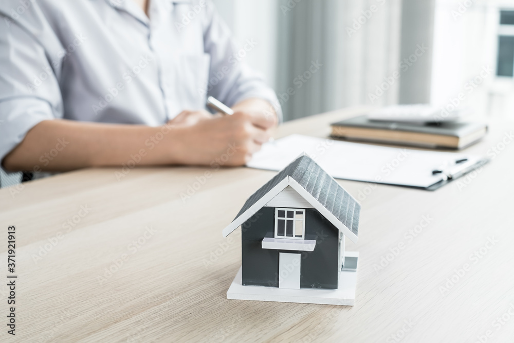Agents working in real estate investment and lease contracts, contract home insurance home purchase and purchase approval for clients